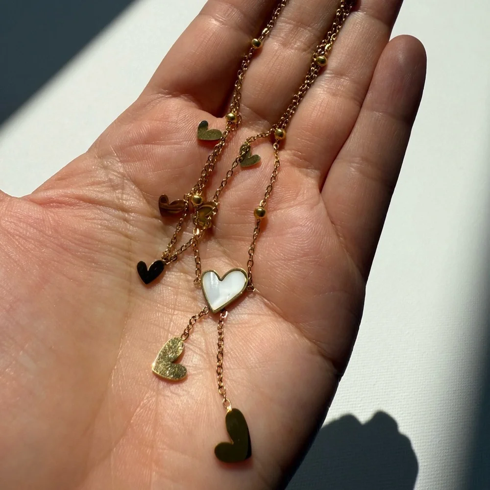 Heart-shaped White Beige Tassel Anklet Gold 18K

Stainless Steel Anklet - Picture 9 of 9